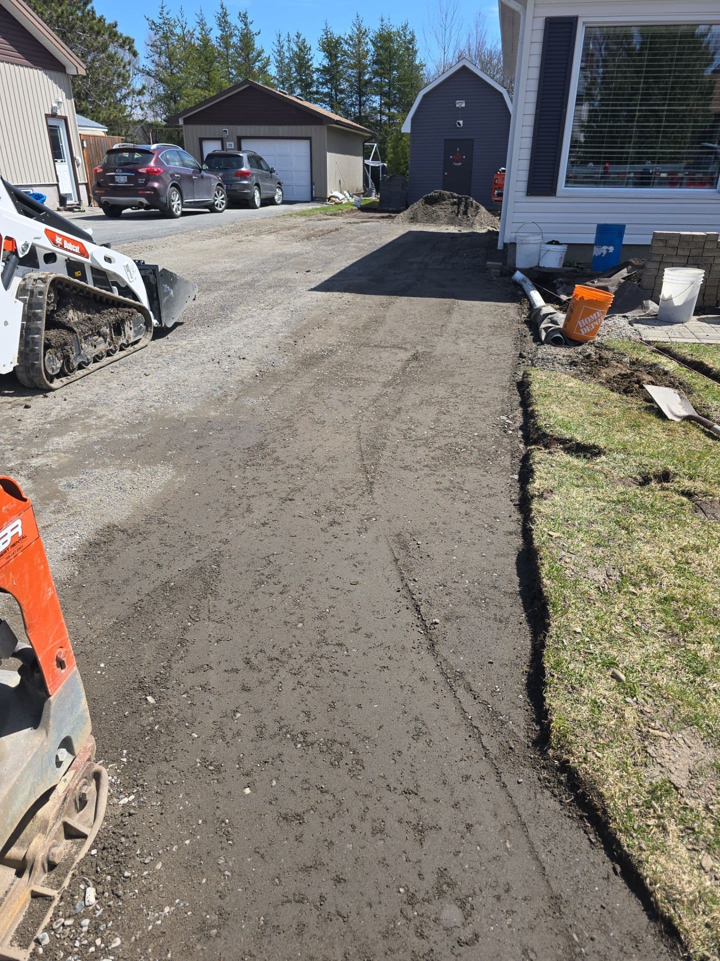 Excavation project photo - Driveway Regrade & Gravel Base